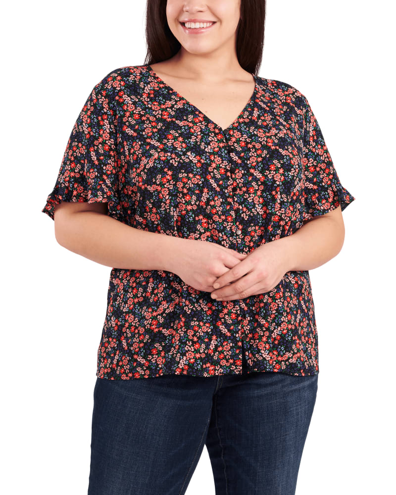 Front of a model wearing a size 1X Loretta Button Loop Frill Sleeve Top in RICH BLACK by CeCe. | dia_product_style_image_id:263433